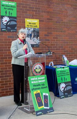 Union County Commissioner Bette Jane Kowalski speaks at a podium.
